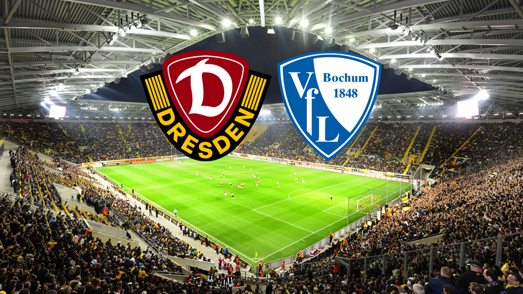 Ein breites, horizontales Bild zeigt ein Fußballstadion, das voll von Fans ist, die gelbe Trikots tragen. Auf dem Spielfeld sind Fußballspieler zu sehen. Am oberen Rand des Bildes, in der Mitte, befinden sich zwei Logos. Das linke Logo ist das Wappen von Dynamo Dresden, das rechte Logo ist das Wappen des VfL Bochum.