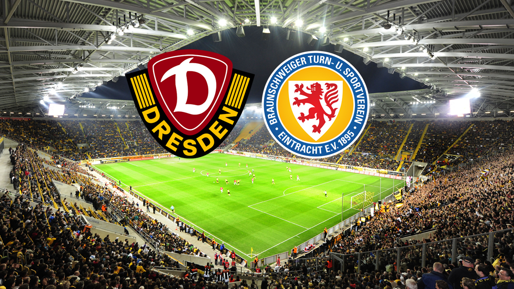 Ein Weitwinkelbild eines Fußballstadions, gefüllt mit jubelnden Fans. Über dem Spielfeld schweben die Logos zweier Fußballvereine: Dynamo Dresden (links, dunkelrot und gelb mit einem „D“) und Eintracht Braunschweig (rechts, blau und gelb mit einem roten Löwen und der Aufschrift „Braunschweiger Turn- u. Sportverein Eintracht e.V. 1895“).