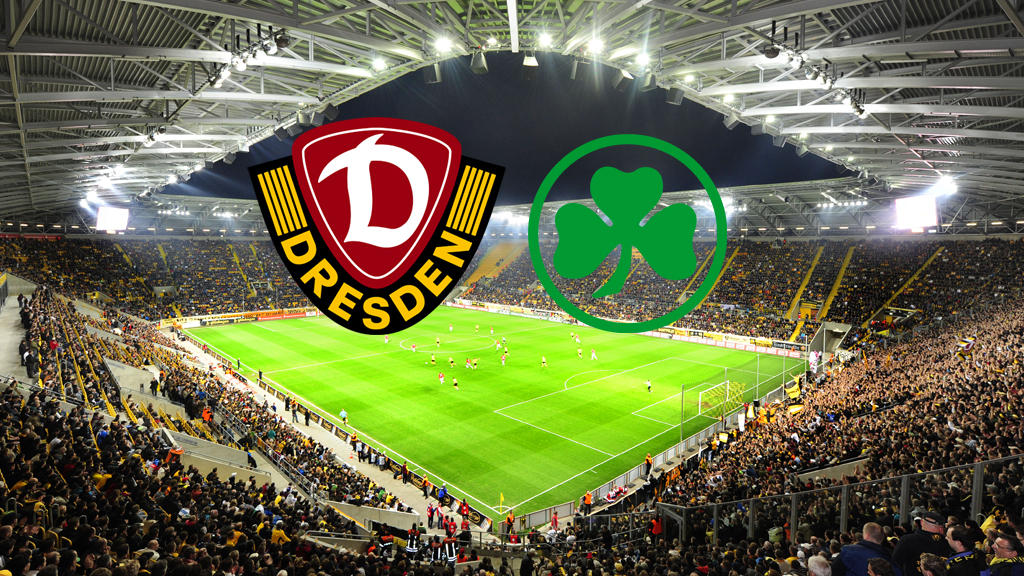 Ein Weitwinkelbild eines Fußballstadions, gefüllt mit jubelnden Fans. Über dem Spielfeld schweben die Logos zweier Fußballvereine: Dynamo Dresden (links, dunkelrot und gelb mit einem „D“) und SpVgg Greuther Fürth (rechts, grün mit einem Kleeblatt).